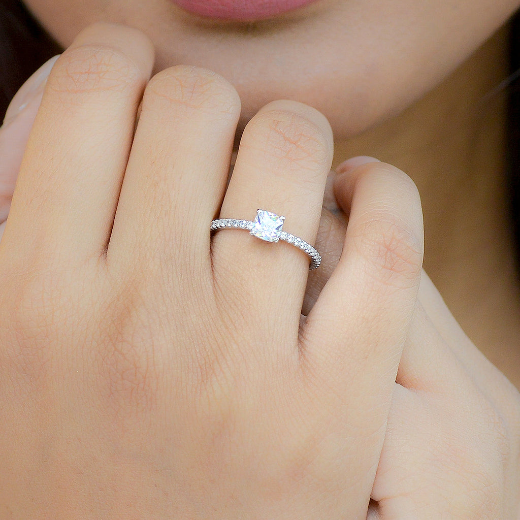 Princess cut diamond engagement ring on hand